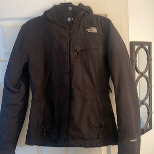 The North Face ski jacket. S/P. Black. Great used condition.